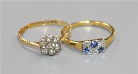 An early 20th century 18ct gold and diamond cluster ring and an 18ct gold, sapphire and diamond cluster tablet ring.